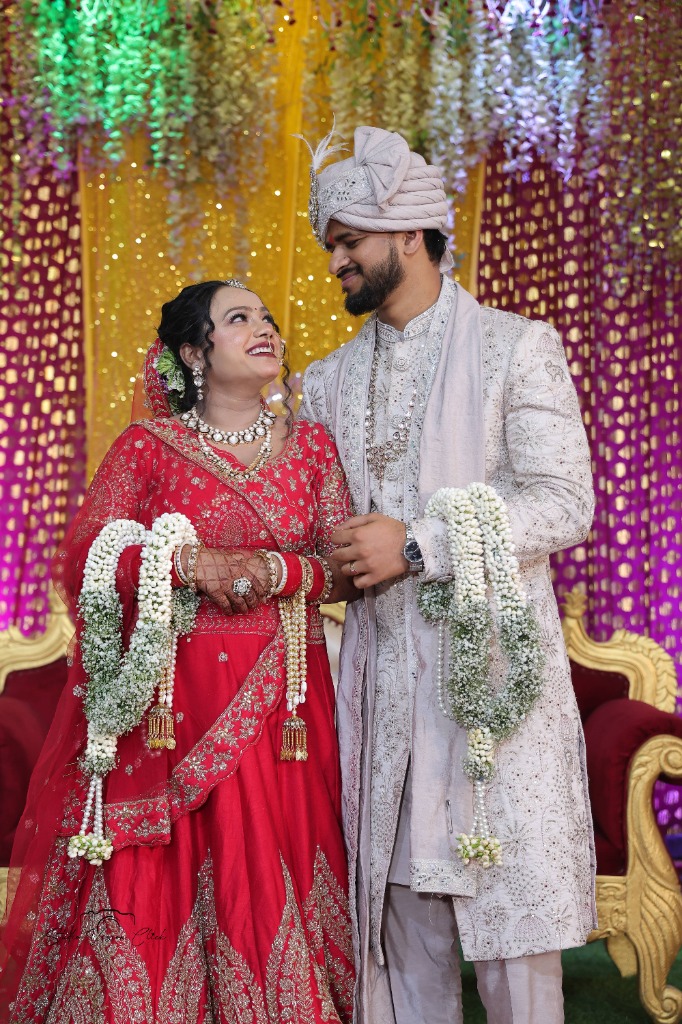 Couple with garlands